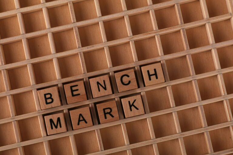Wooden Letter Tiles Spelling 'Benchmark'