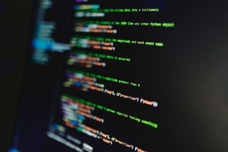 Python code on a dark screen parsing JSON earthquake data