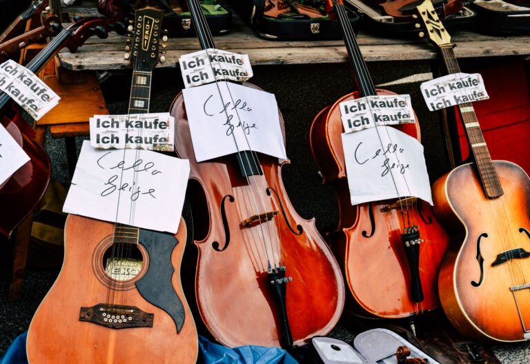 Vintage String Instruments Display at Market